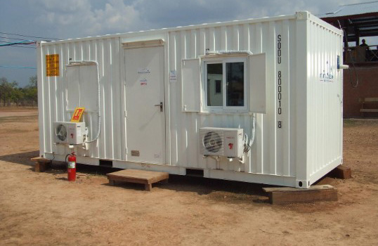 Portable office solution with air conditioning and fire extinguisher.