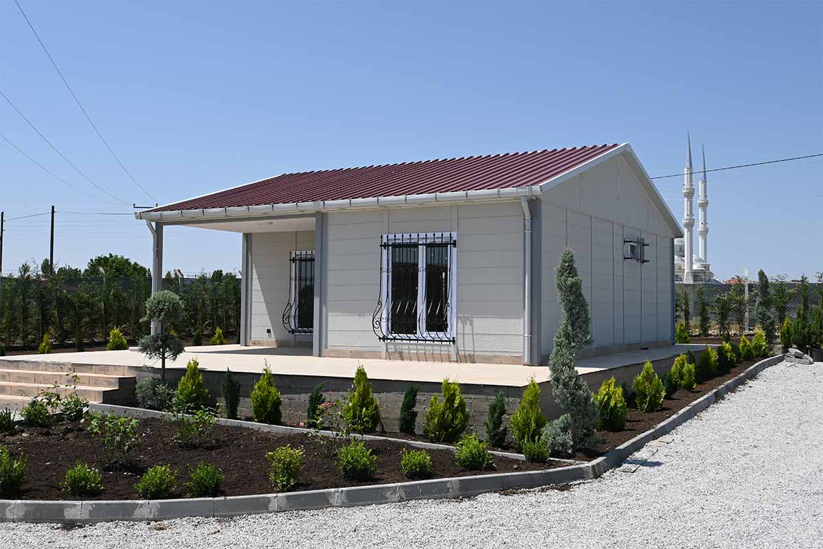 Small modular house with red roof